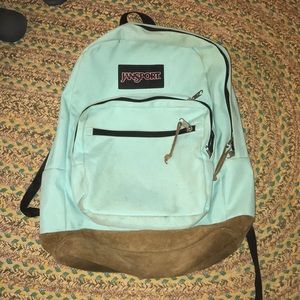 Light Blue Jansport backpack w suede bottom
